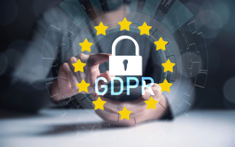 Hand reaching toward GDPR lock symbol representing data protection rights