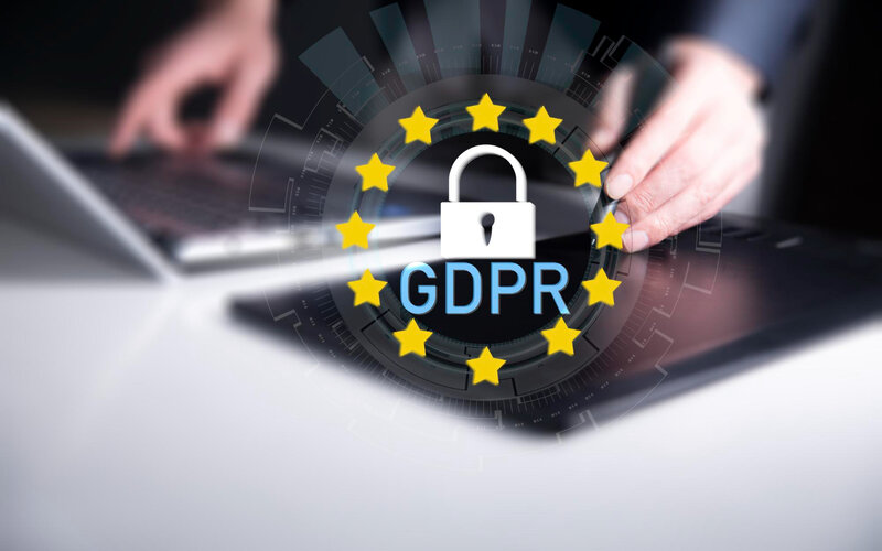 GDPR lock symbol with EU stars overlay on laptop keyboard